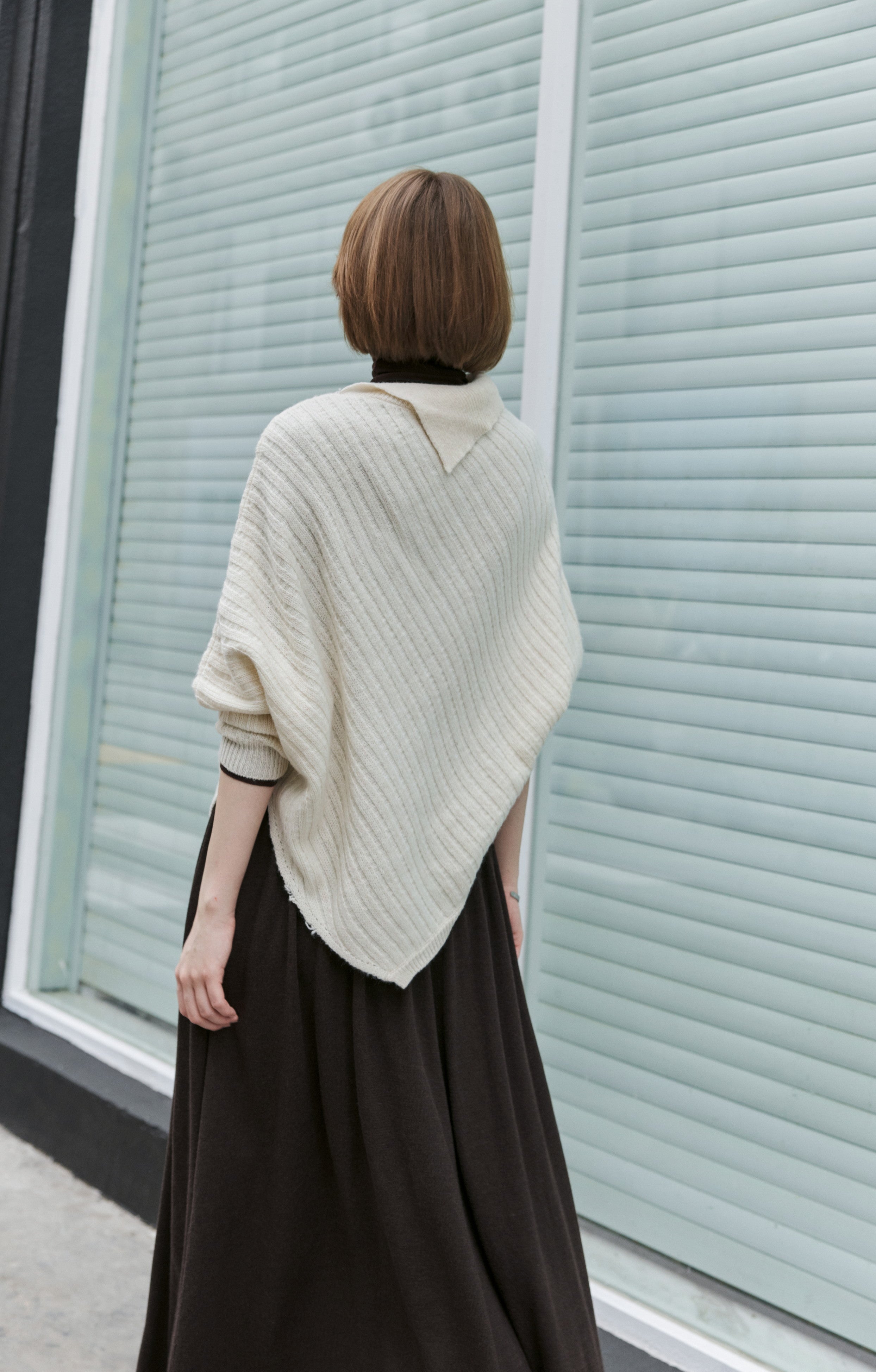 ASYMMETRIC OVER KNIT SWEATER