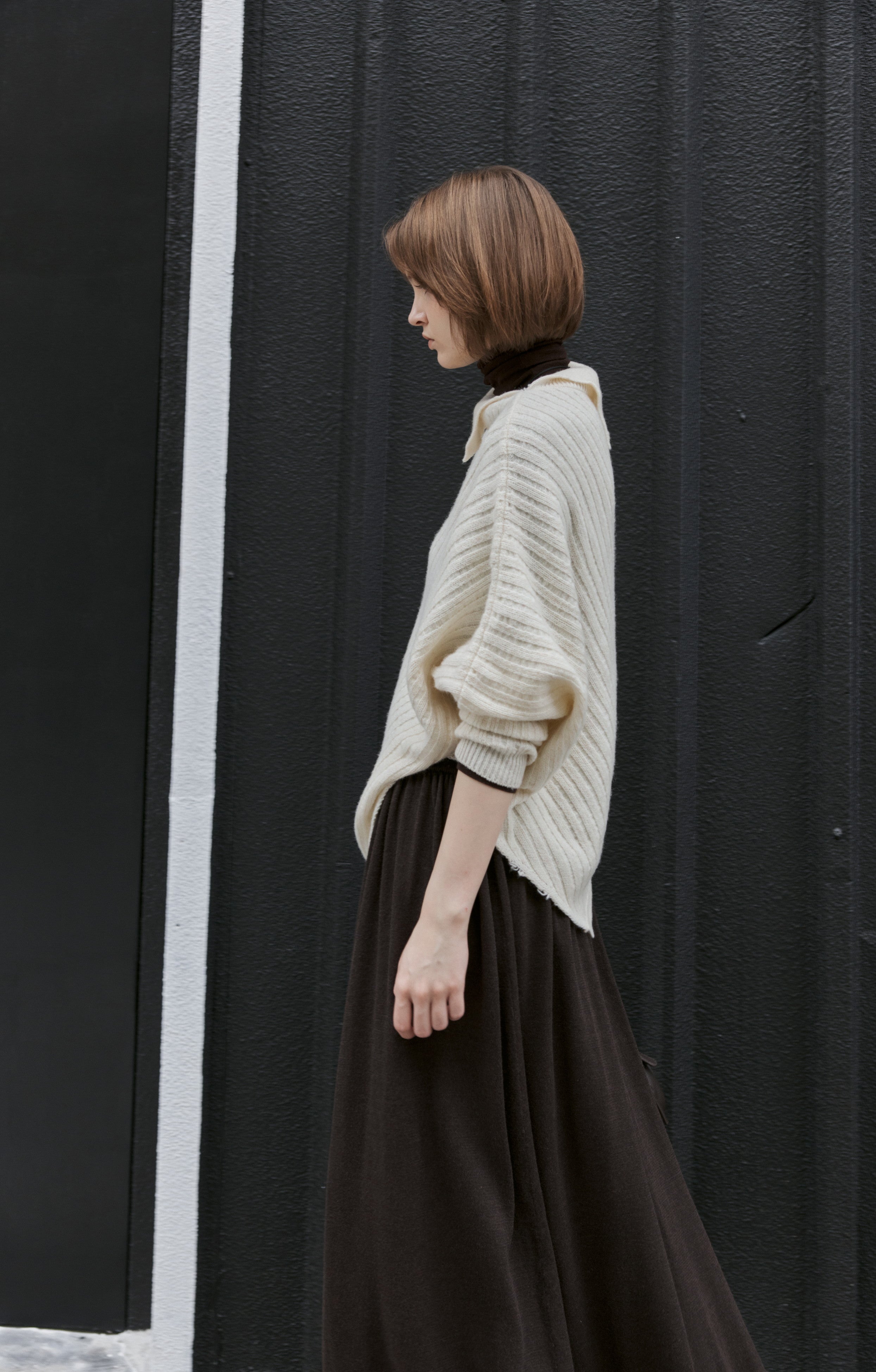 ASYMMETRIC OVER KNIT SWEATER