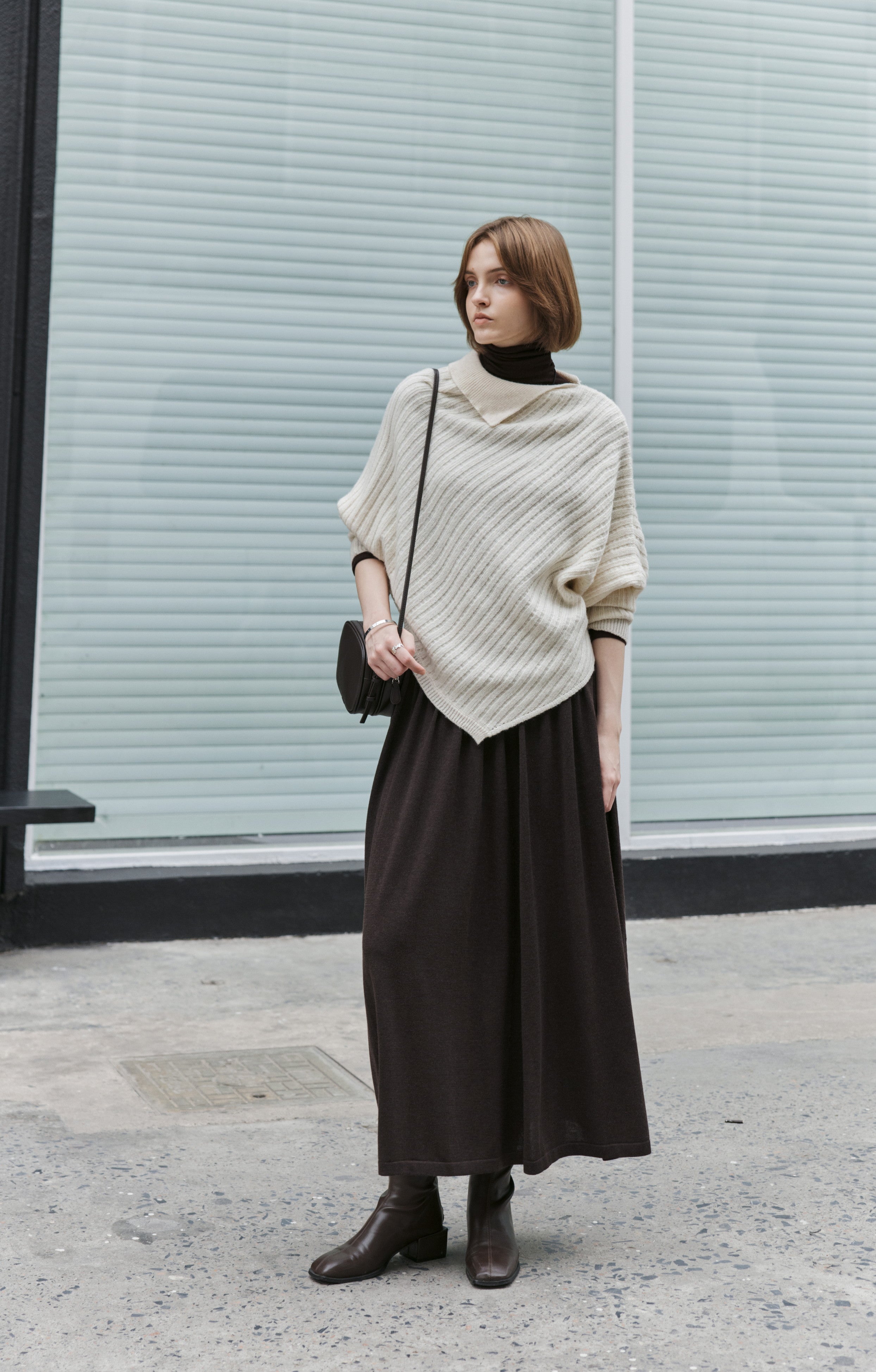 ASYMMETRIC OVER KNIT SWEATER