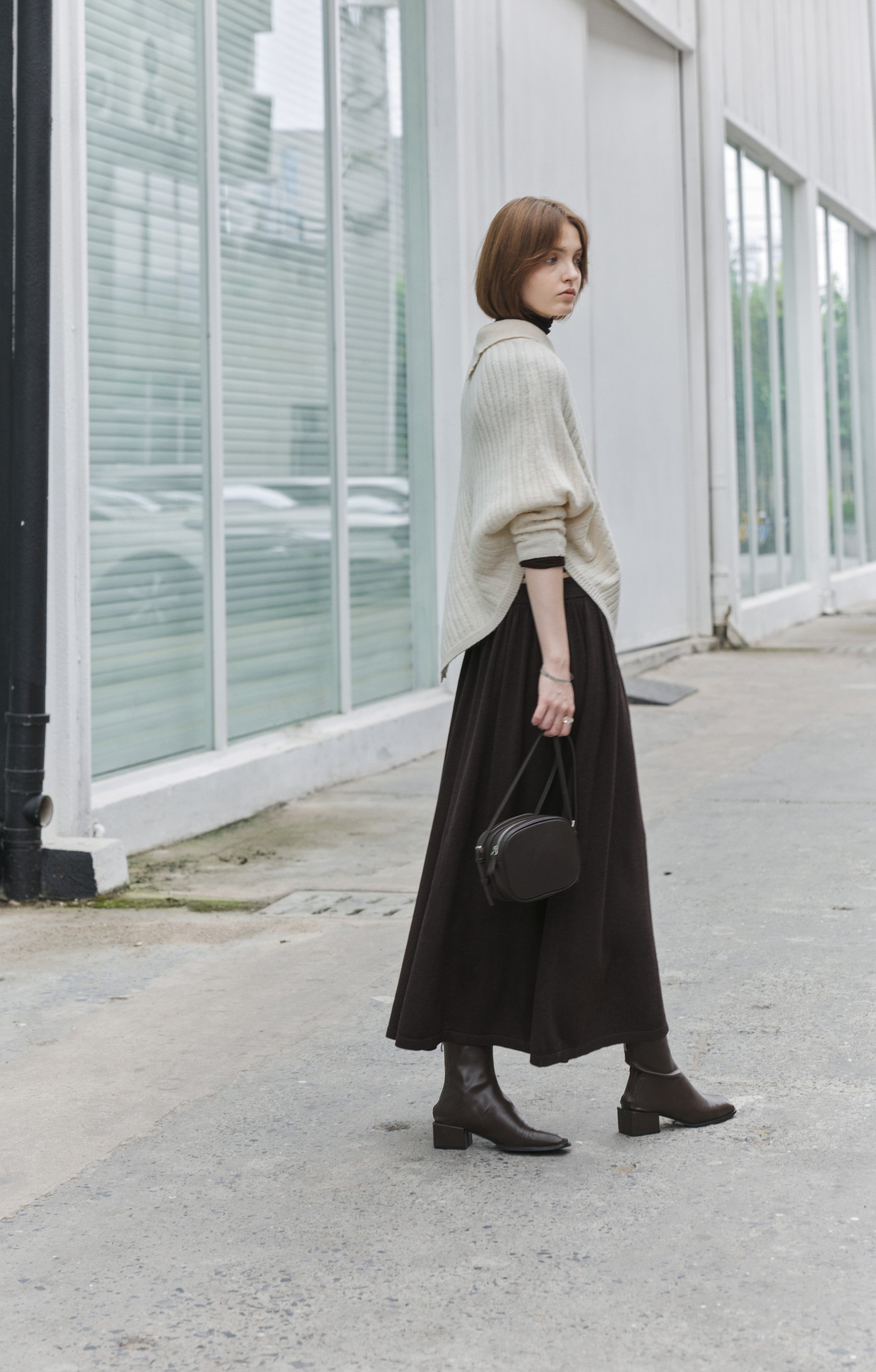 ASYMMETRIC OVER KNIT SWEATER