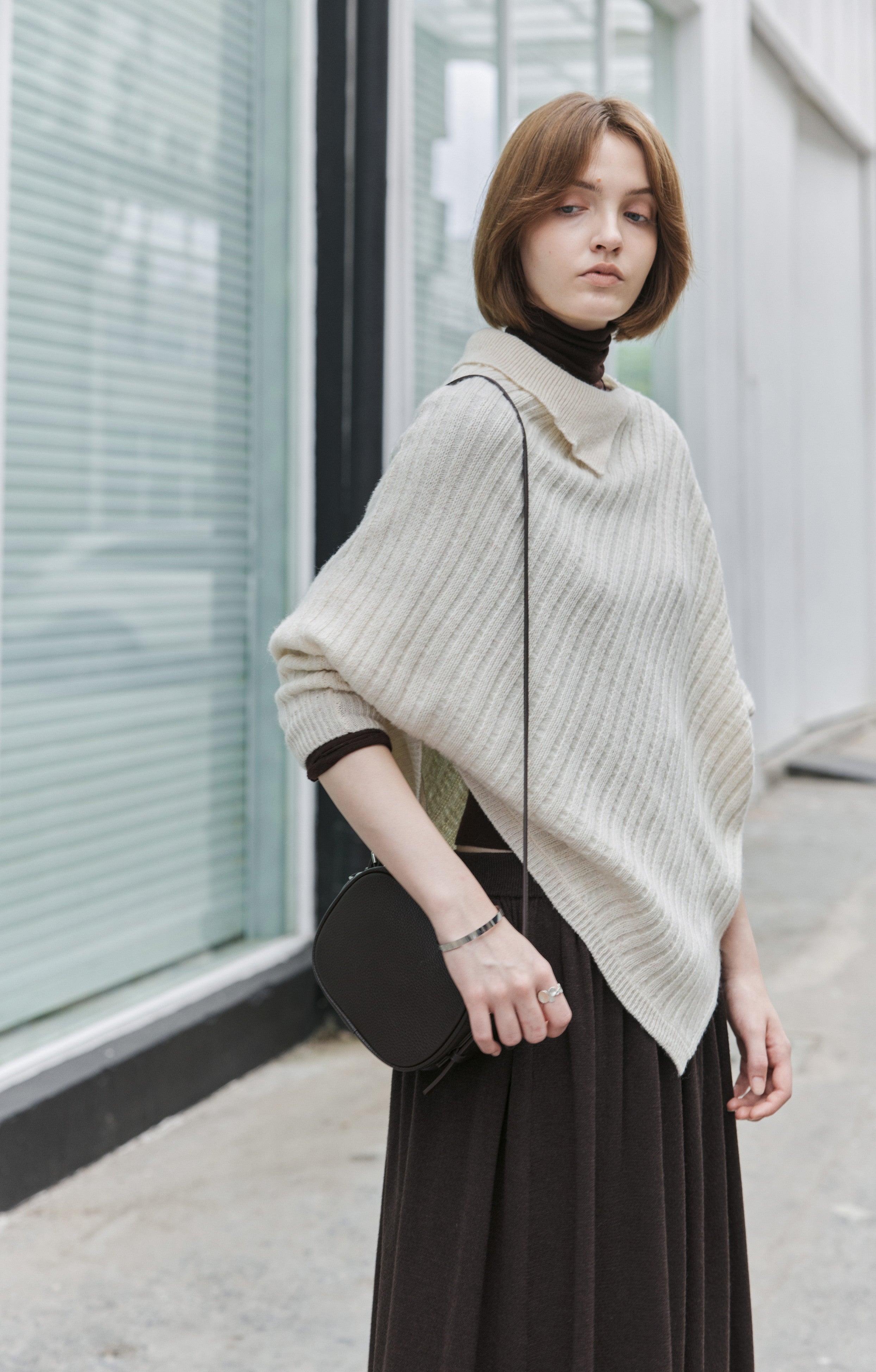 ASYMMETRIC OVER KNIT SWEATER