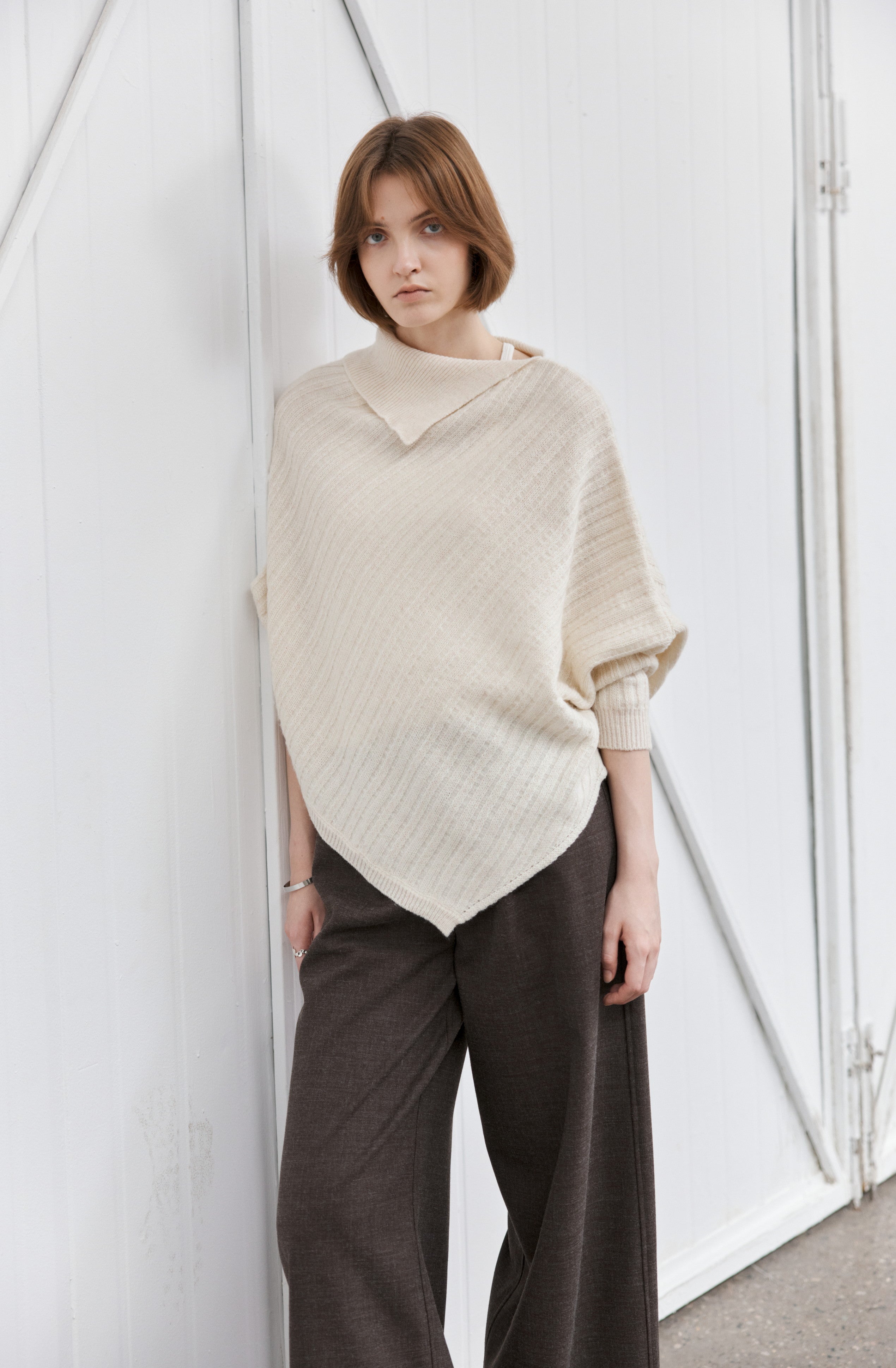 ASYMMETRIC OVER KNIT SWEATER
