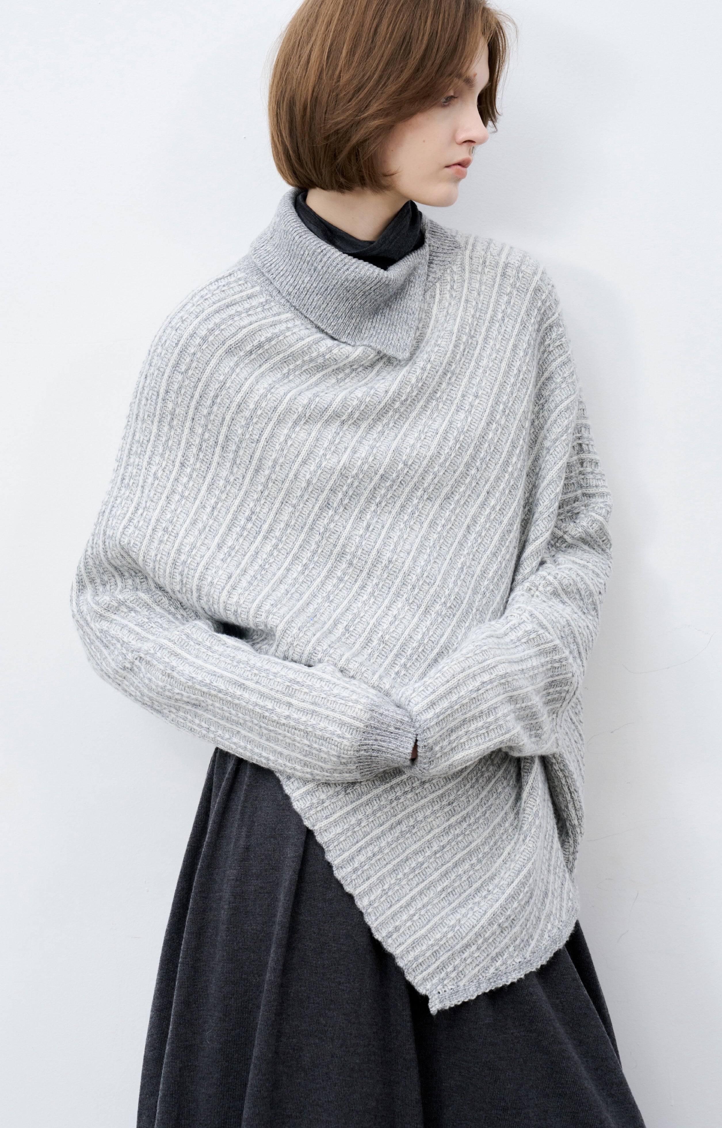 ASYMMETRIC OVER KNIT SWEATER