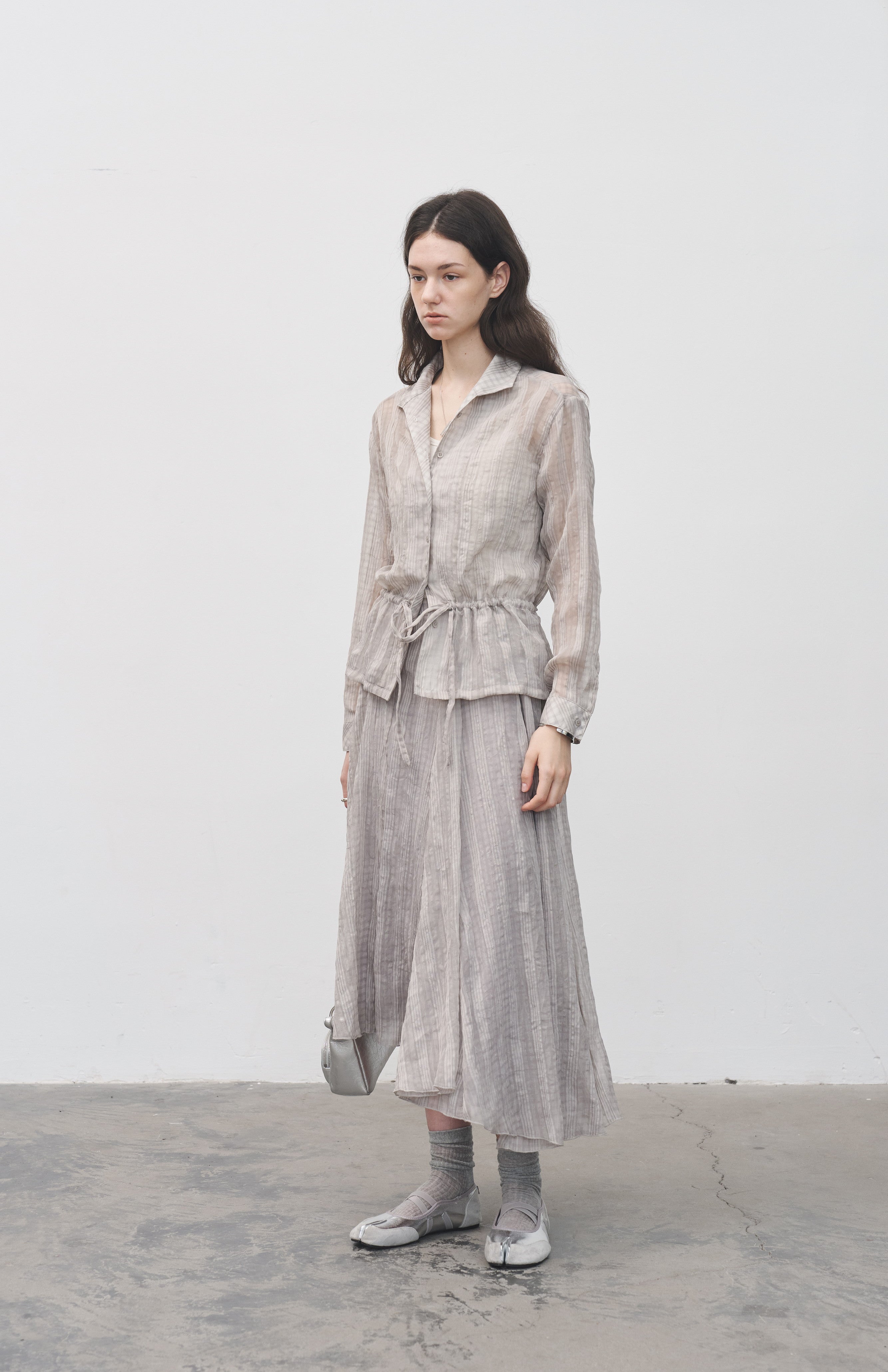 WRINKLED PLAID ASYM SKIRT