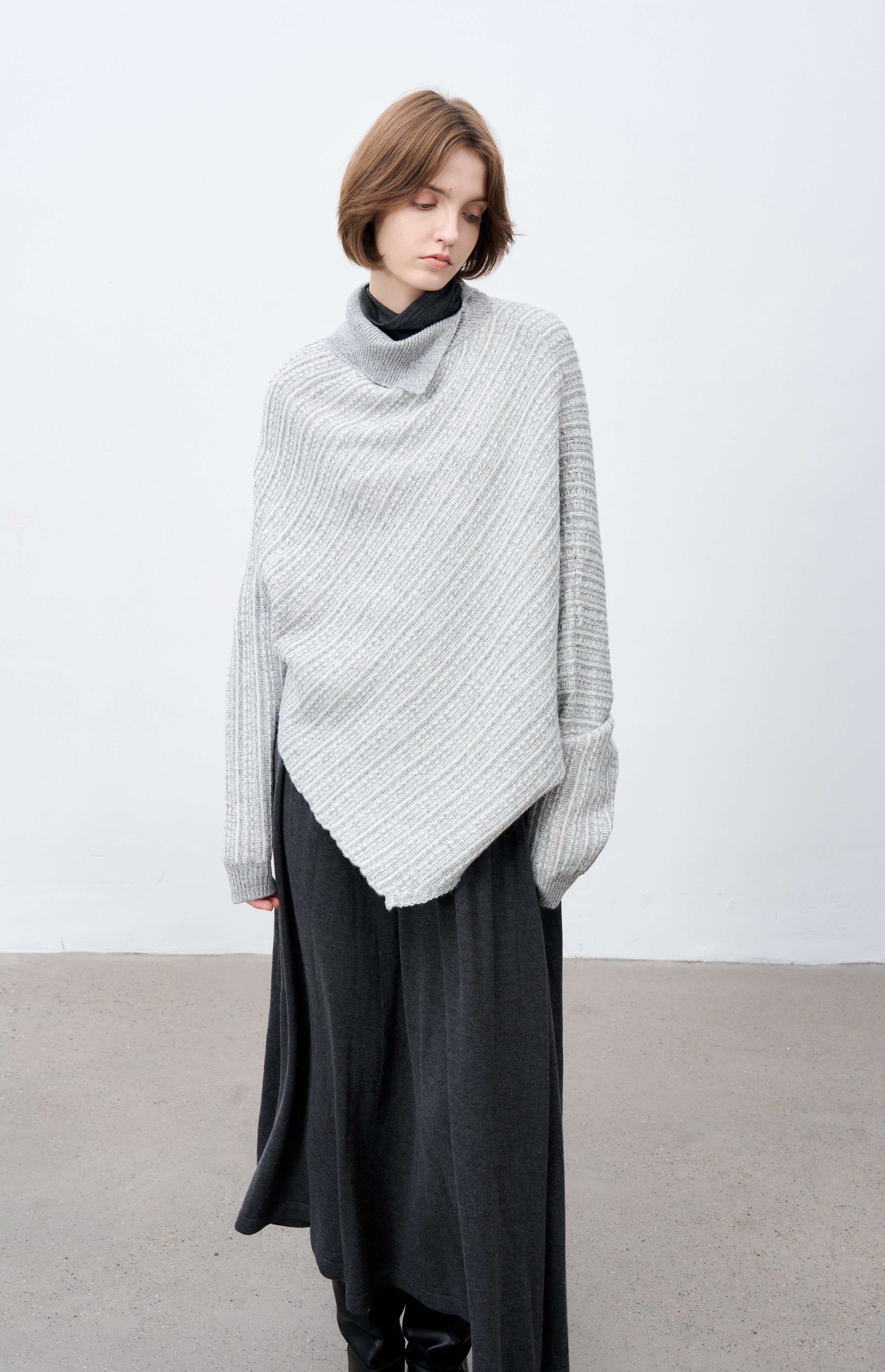 ASYMMETRIC OVER KNIT SWEATER