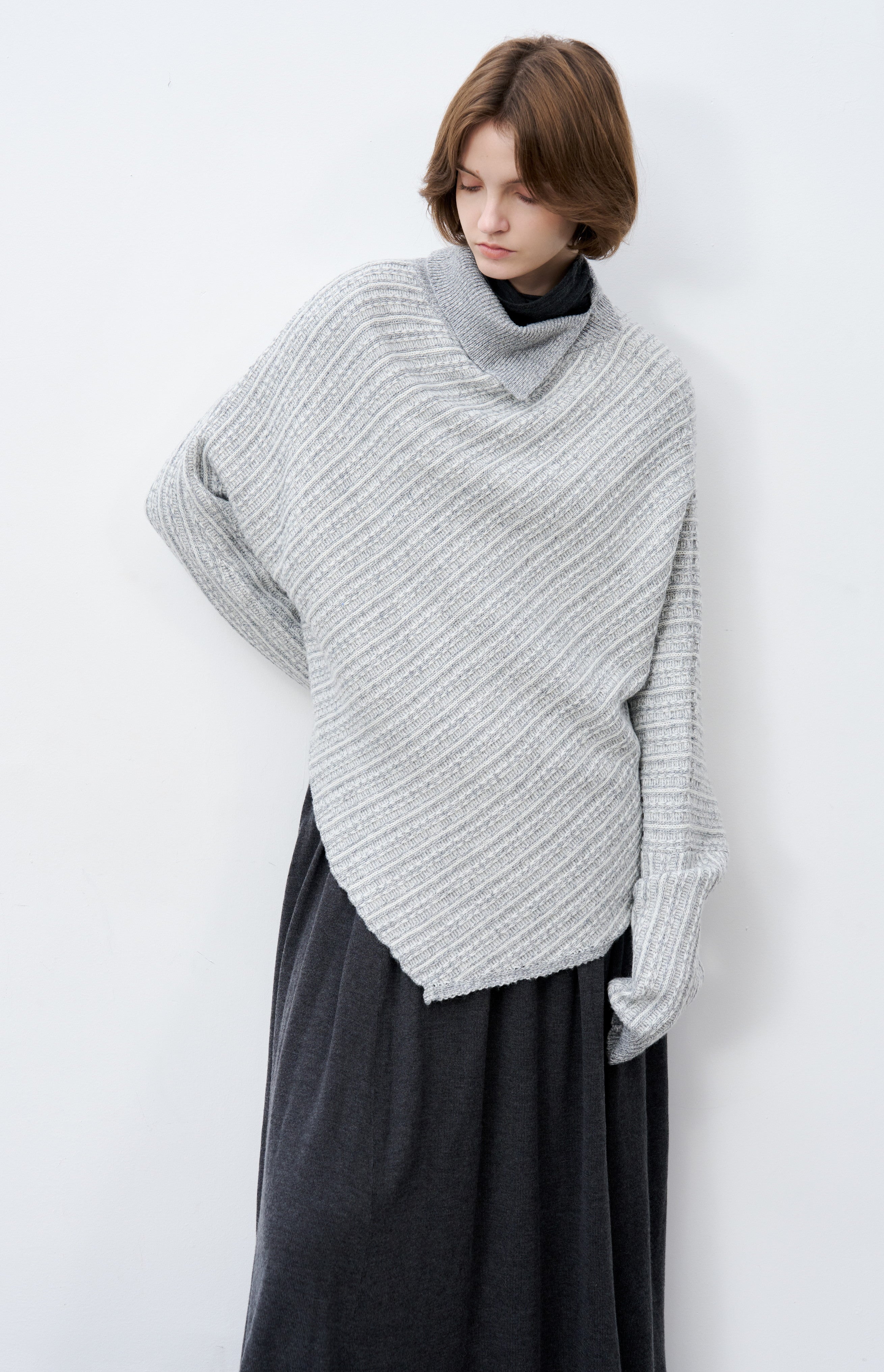 ASYMMETRIC OVER KNIT SWEATER