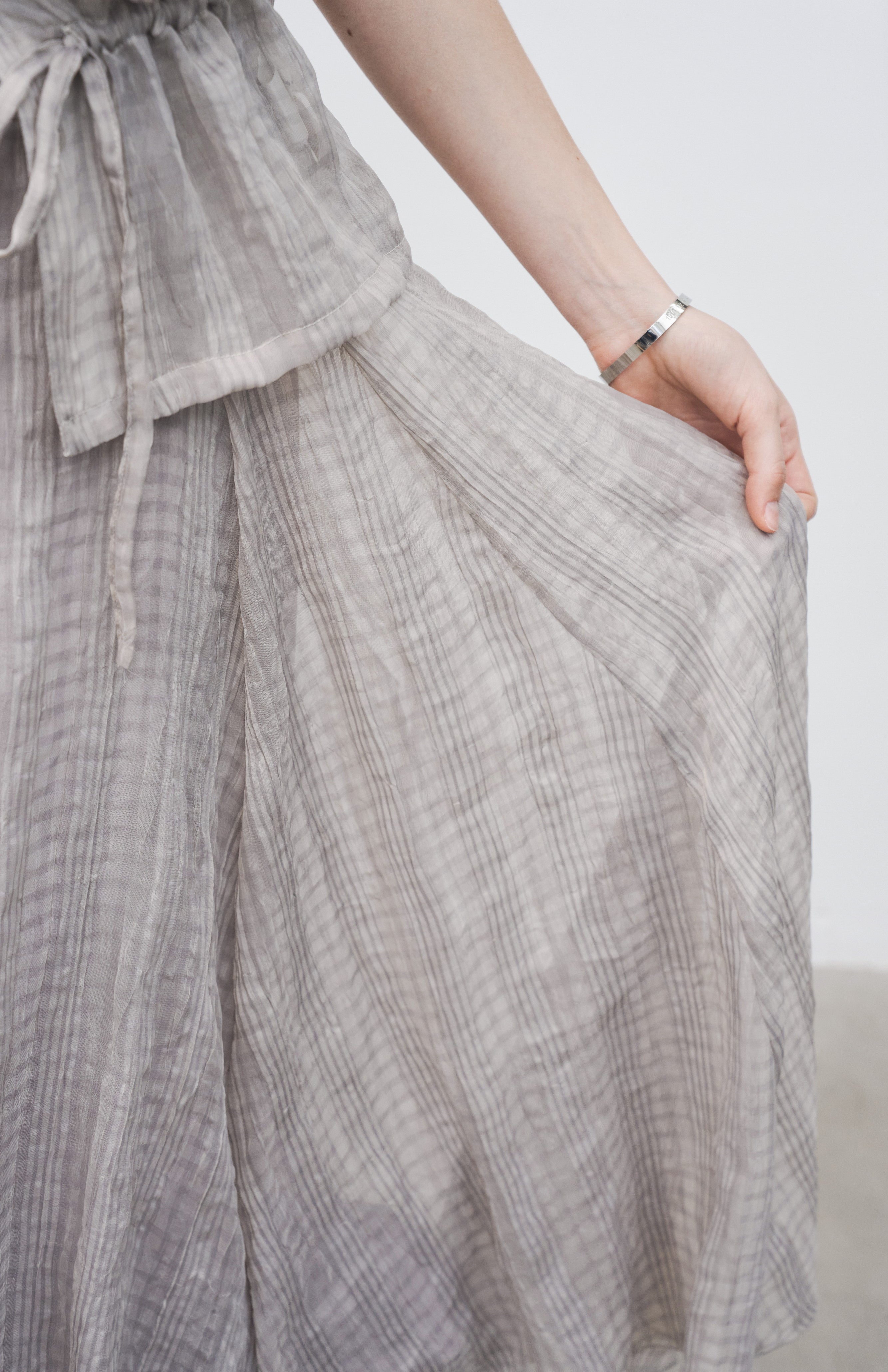 WRINKLED PLAID ASYM SKIRT / 링클 체크 아심 스커트