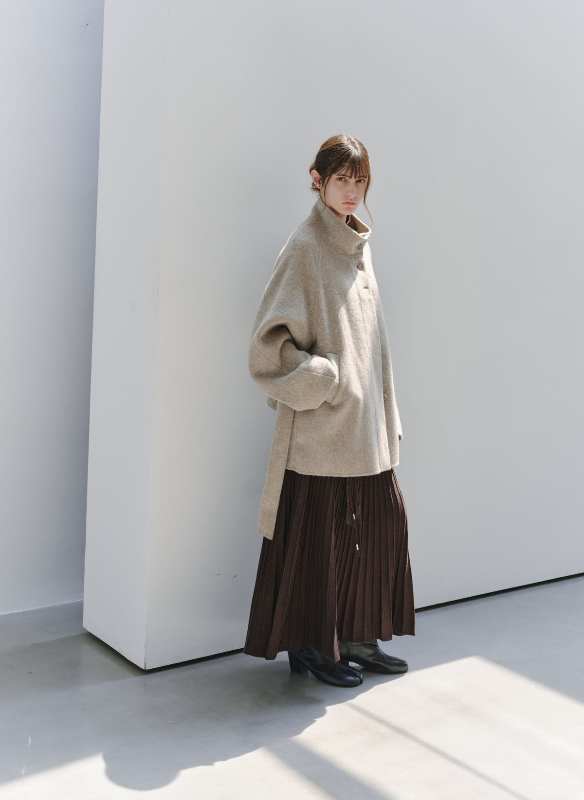 DRAPE PLEATED KNIT SKIRT