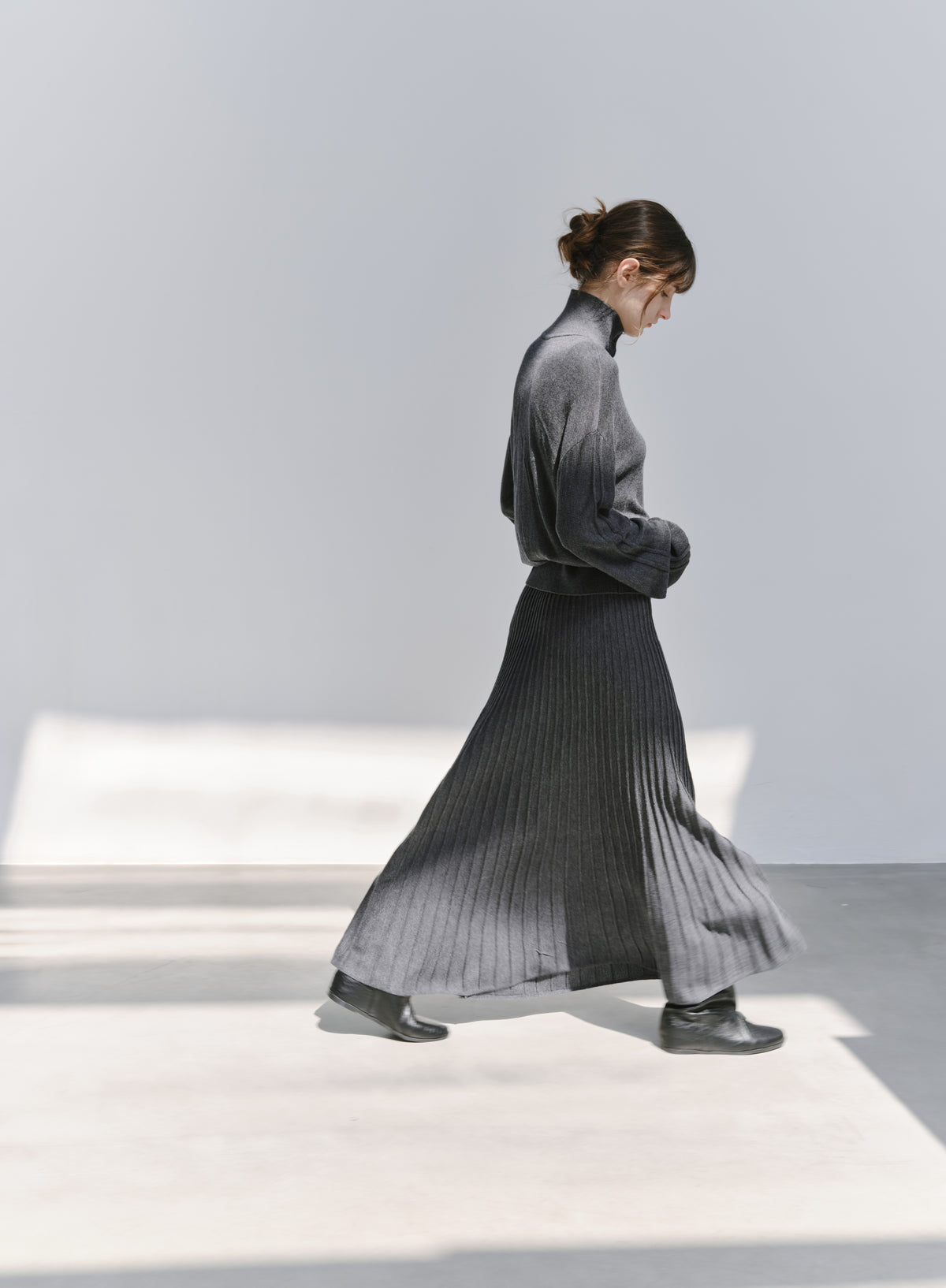 DRAPE PLEATED KNIT SKIRT