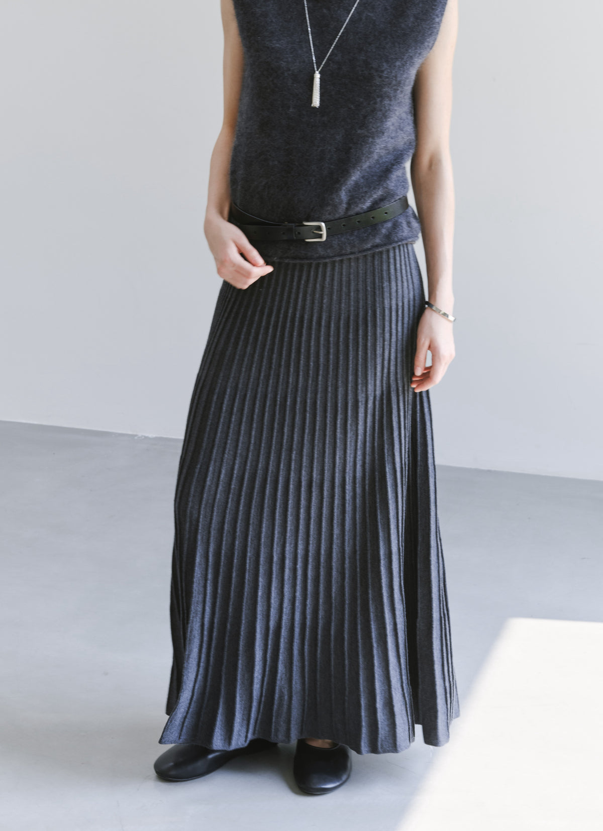 DRAPE PLEATED KNIT SKIRT