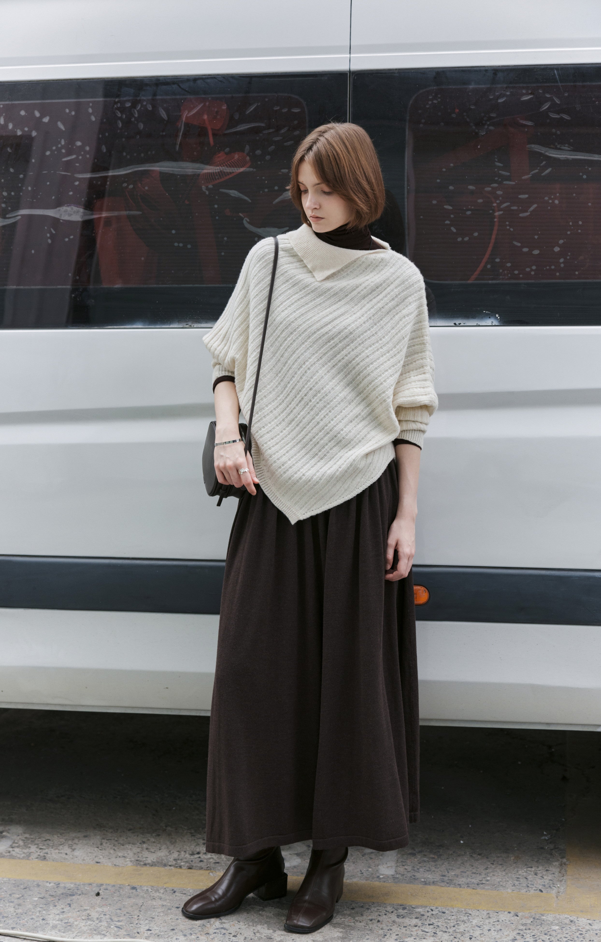 ASYMMETRIC OVER KNIT SWEATER