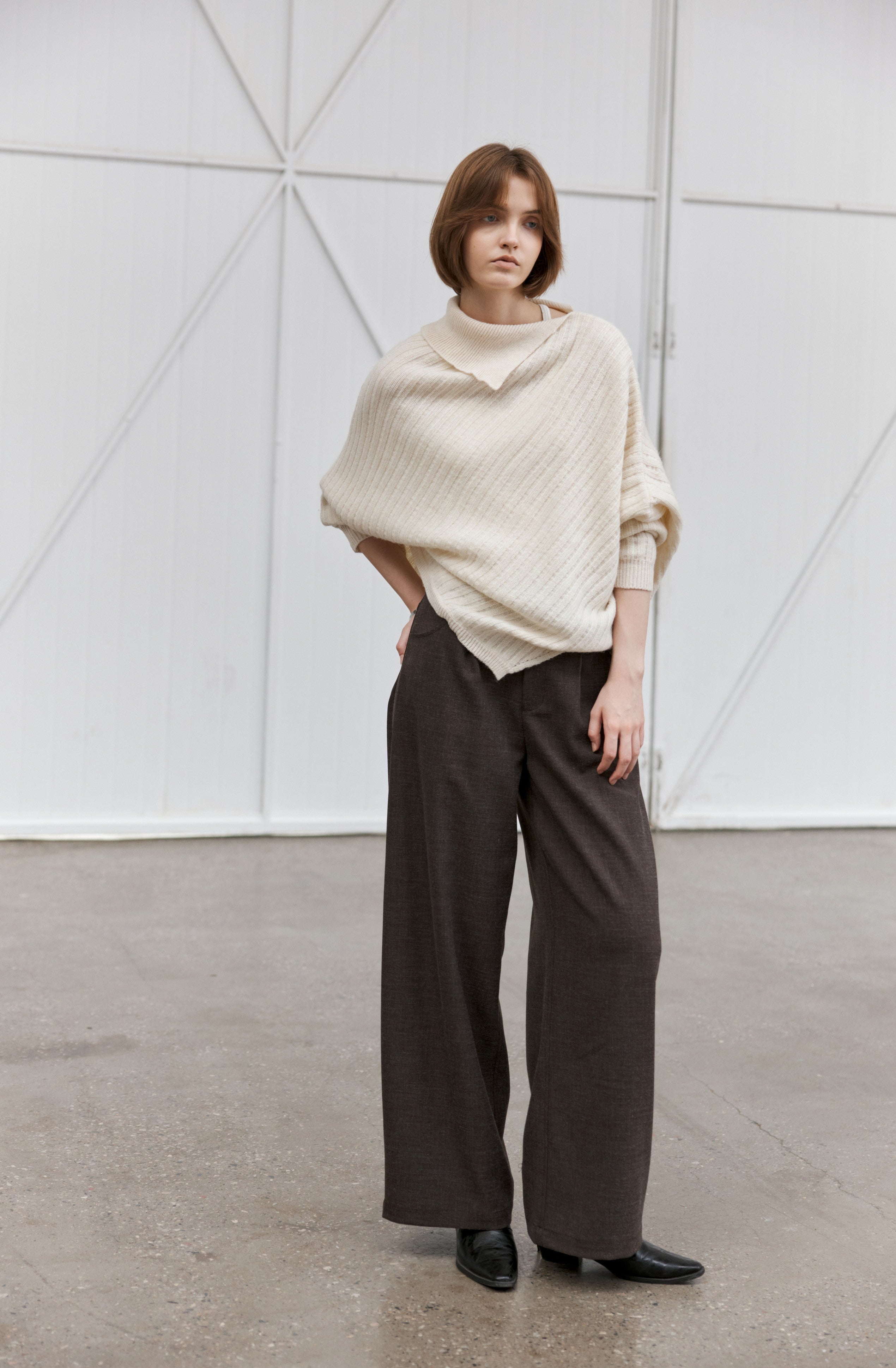 ASYMMETRIC OVER KNIT SWEATER