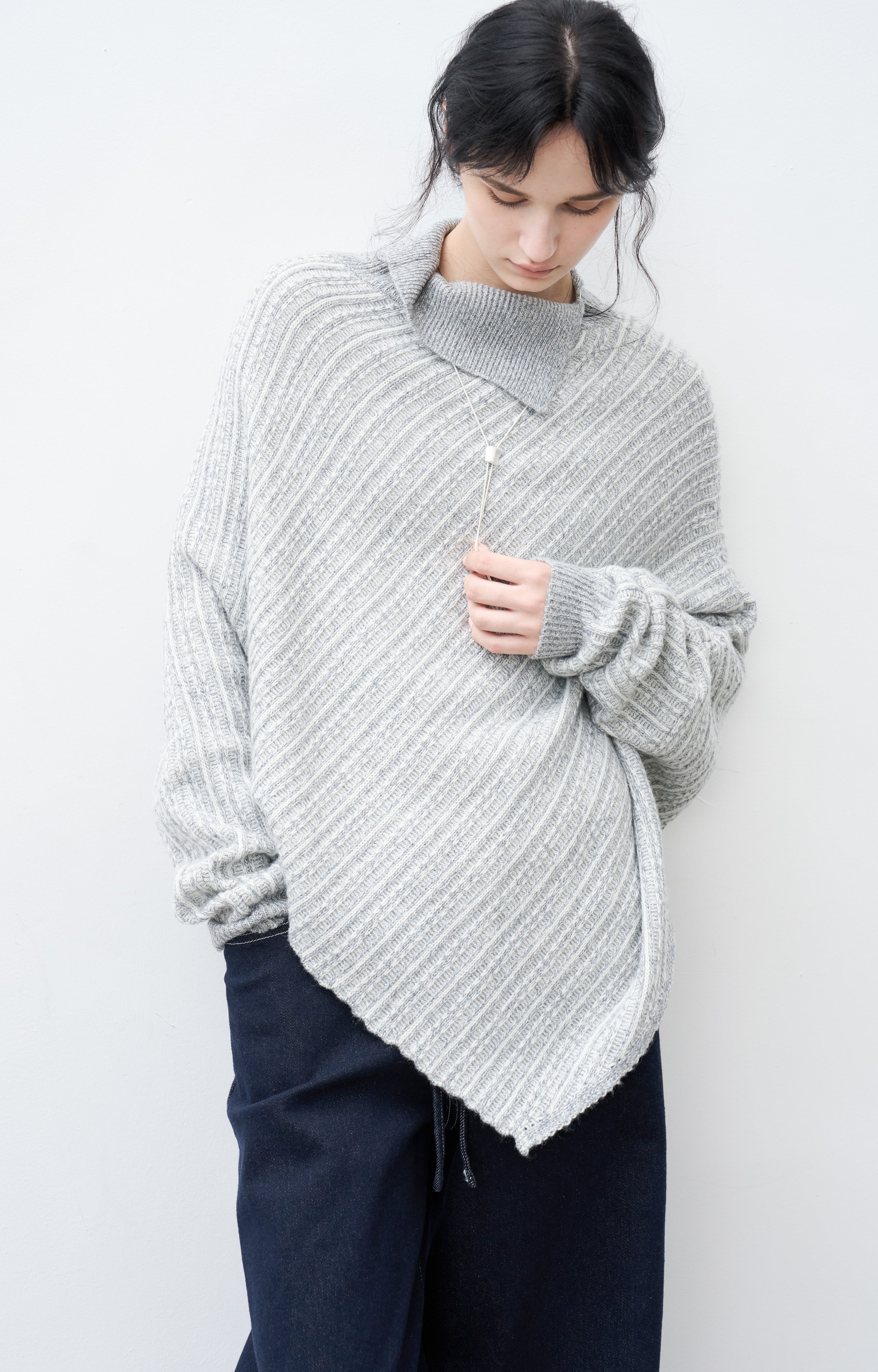 ASYMMETRIC OVER KNIT SWEATER