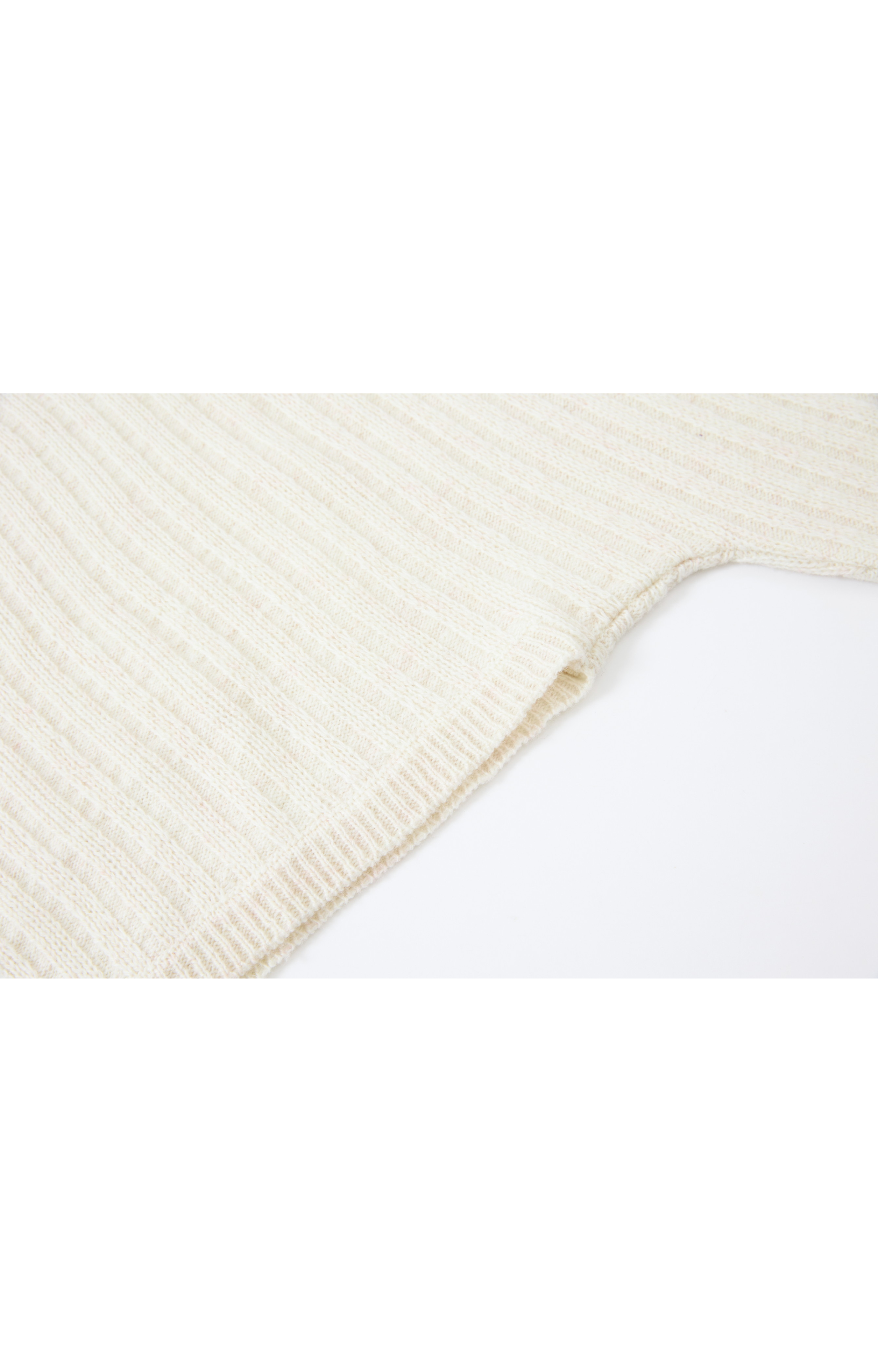 ASYMMETRIC OVER KNIT SWEATER