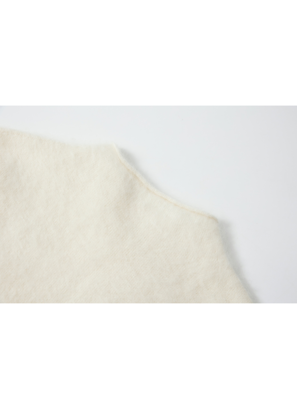 ROLL HEM SLEEVELESS WOOL TOP