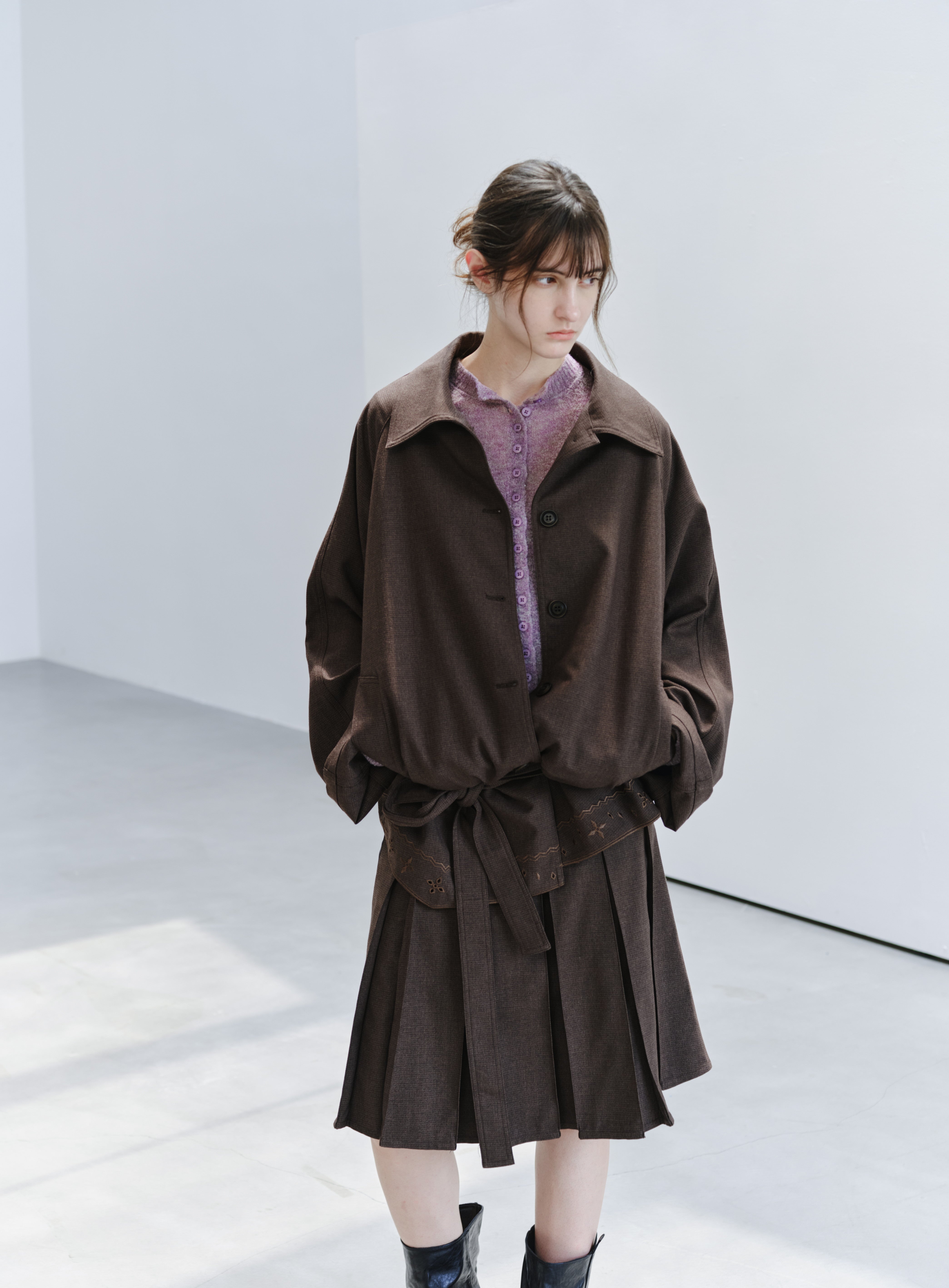 BACK LEATHER PLEATED SKIRT