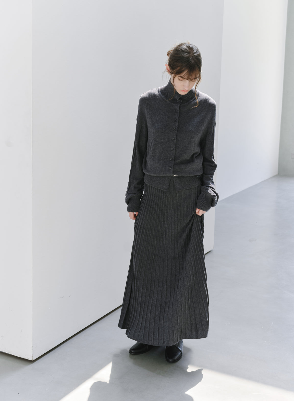 DRAPE PLEATED KNIT SKIRT