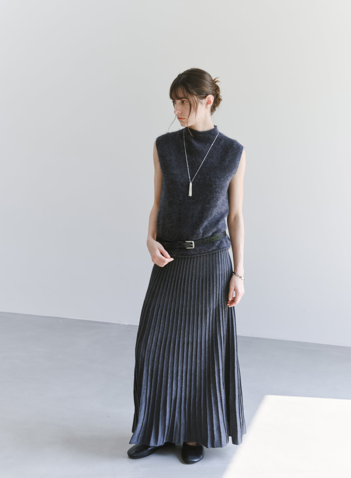 DRAPE PLEATED KNIT SKIRT