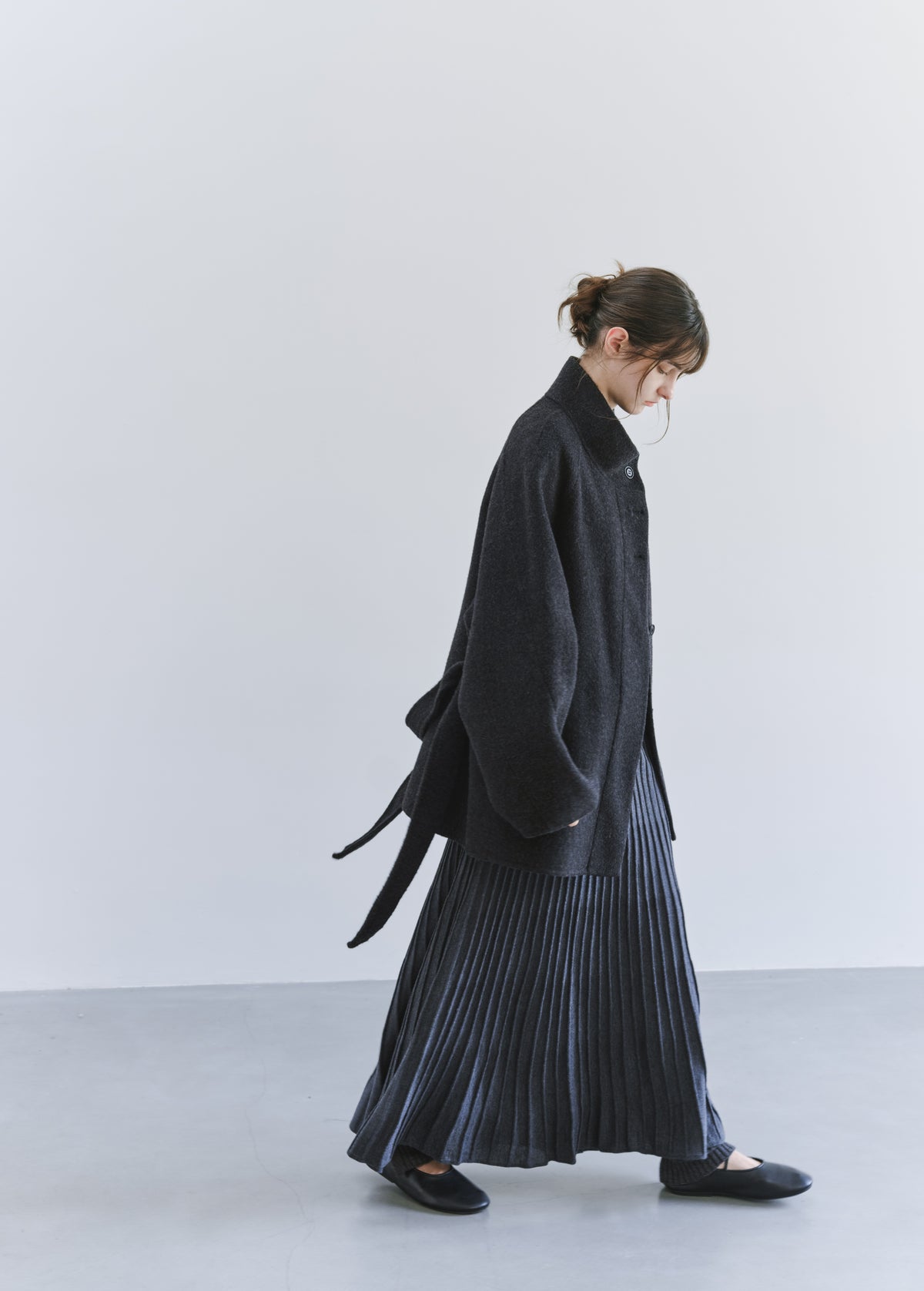 DRAPE PLEATED KNIT SKIRT