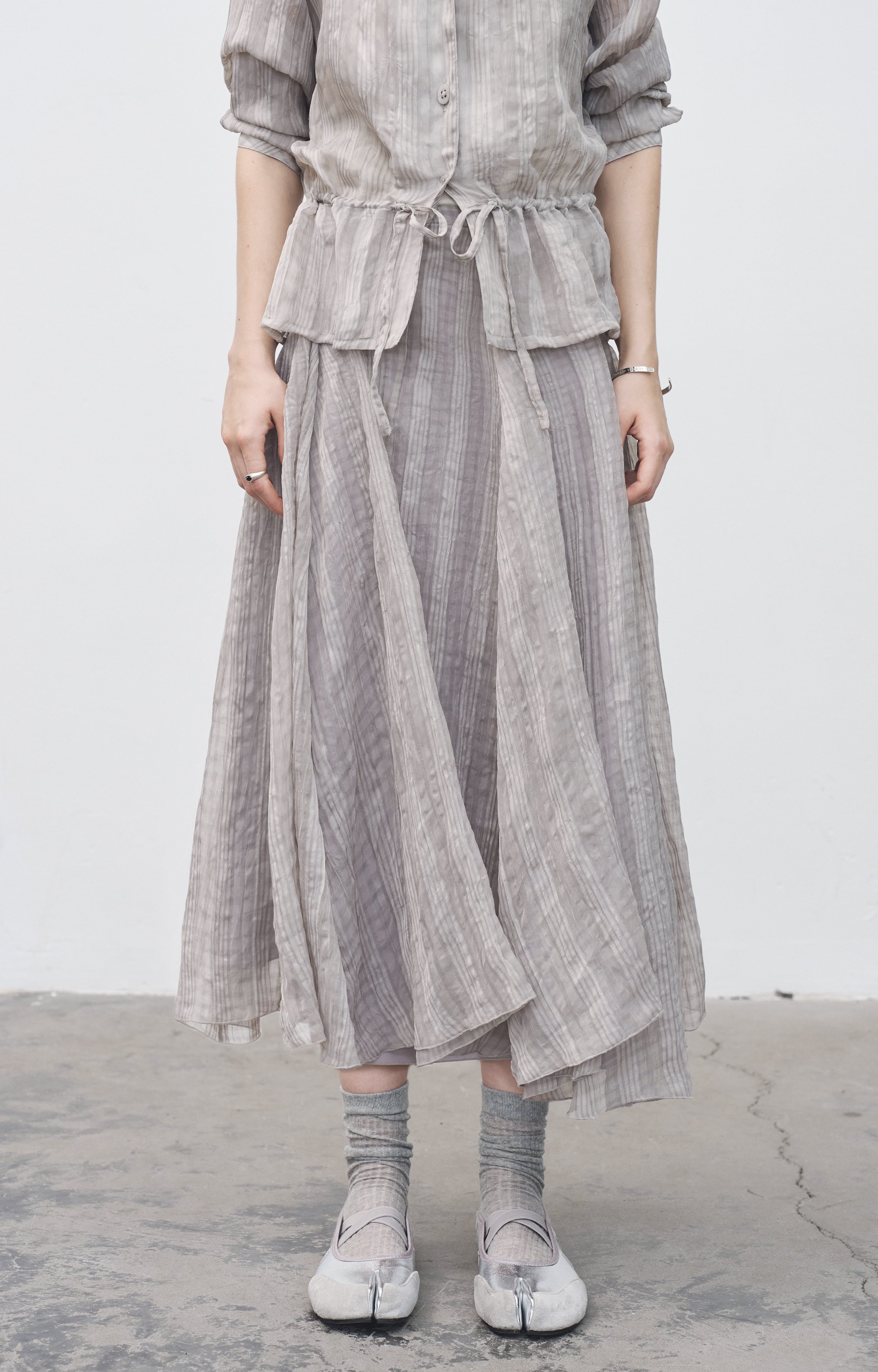 WRINKLED PLAID ASYM SKIRT